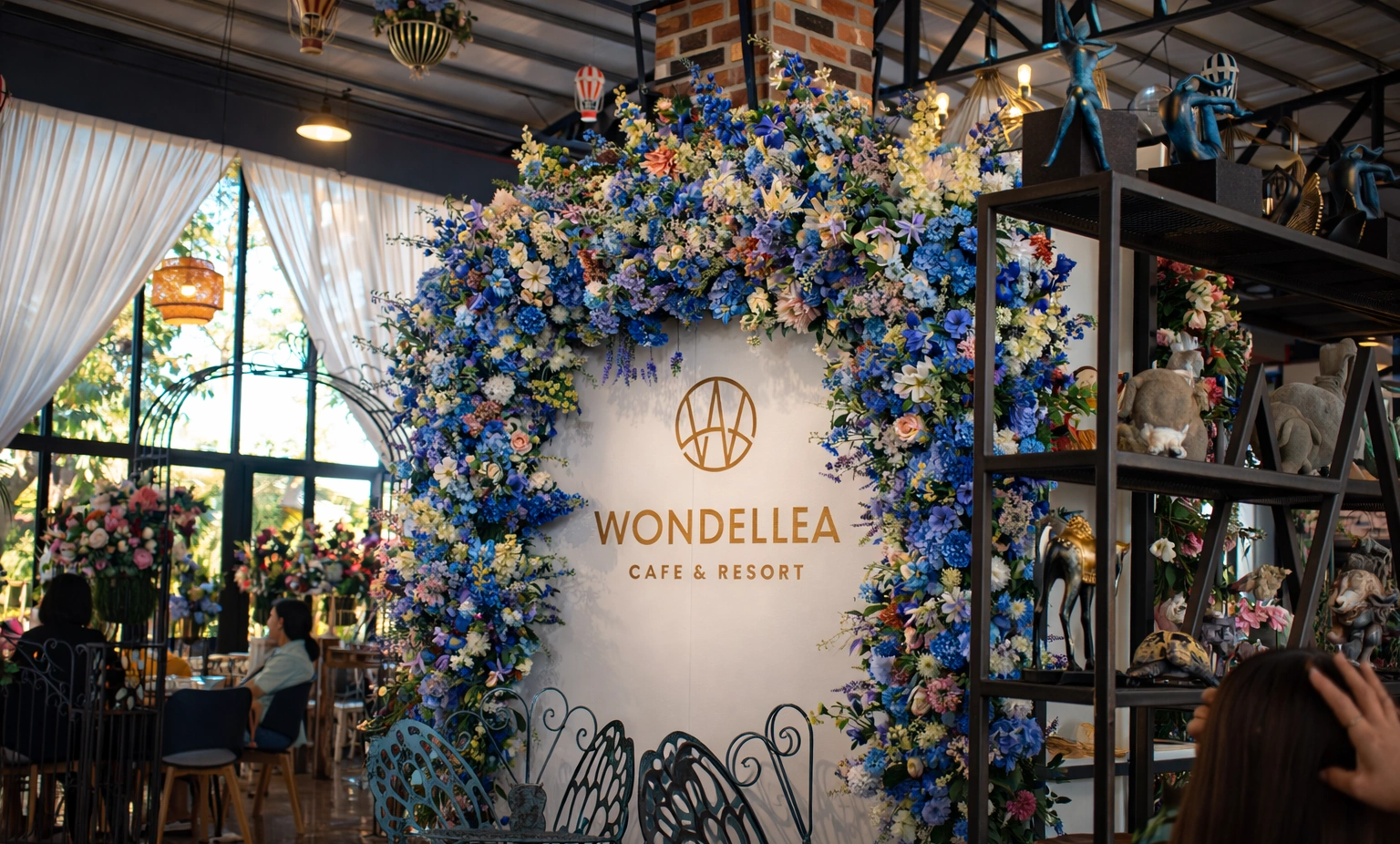 Floral entrance at a garden wedding venue with elegant décor.