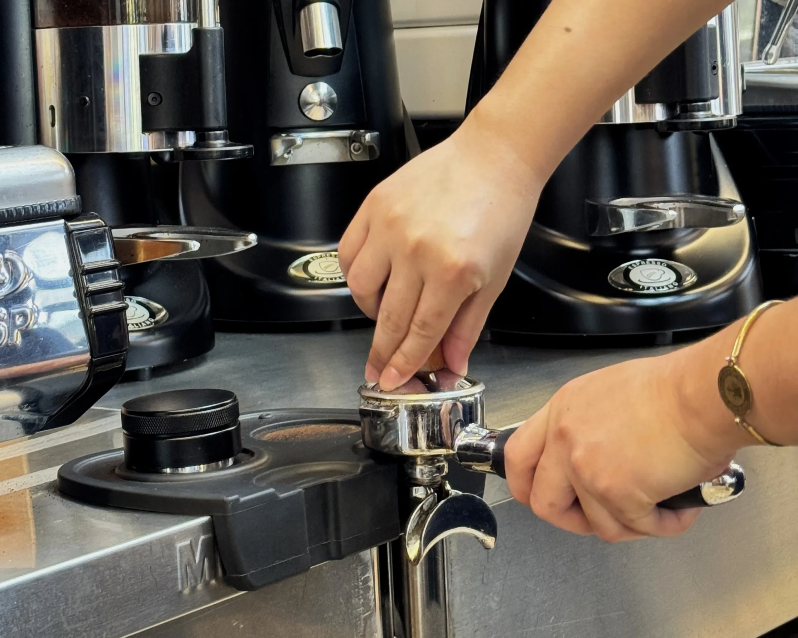 Barista preparing fresh coffee at a coffee shop near me open for handcrafted drinks