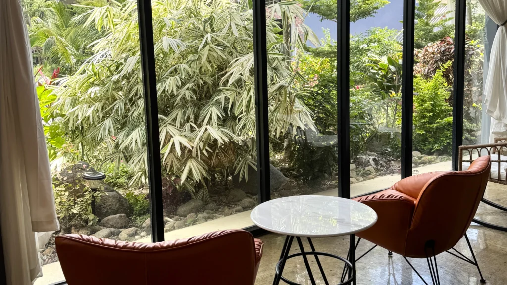 Cozy indoor lounge overlooking greenery at Wondellea Hotel in Silang Cavite.
